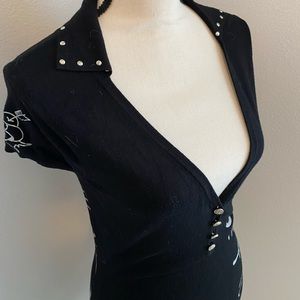 Ed Hardy deep V neck sweater shirt. Extremely comfortable.